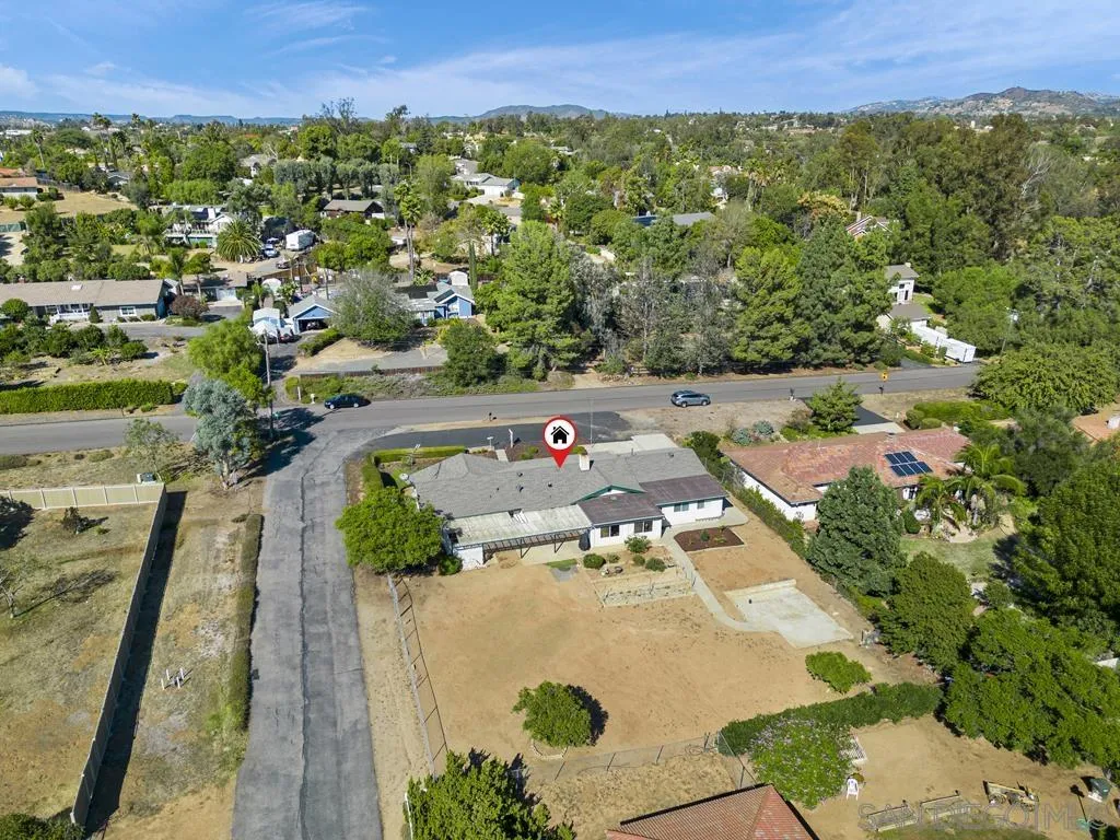 1007 Pepper Tree Lane Fallbrook, CA 92028 - Photo 33 of 34 an aerial view of a house with a yard