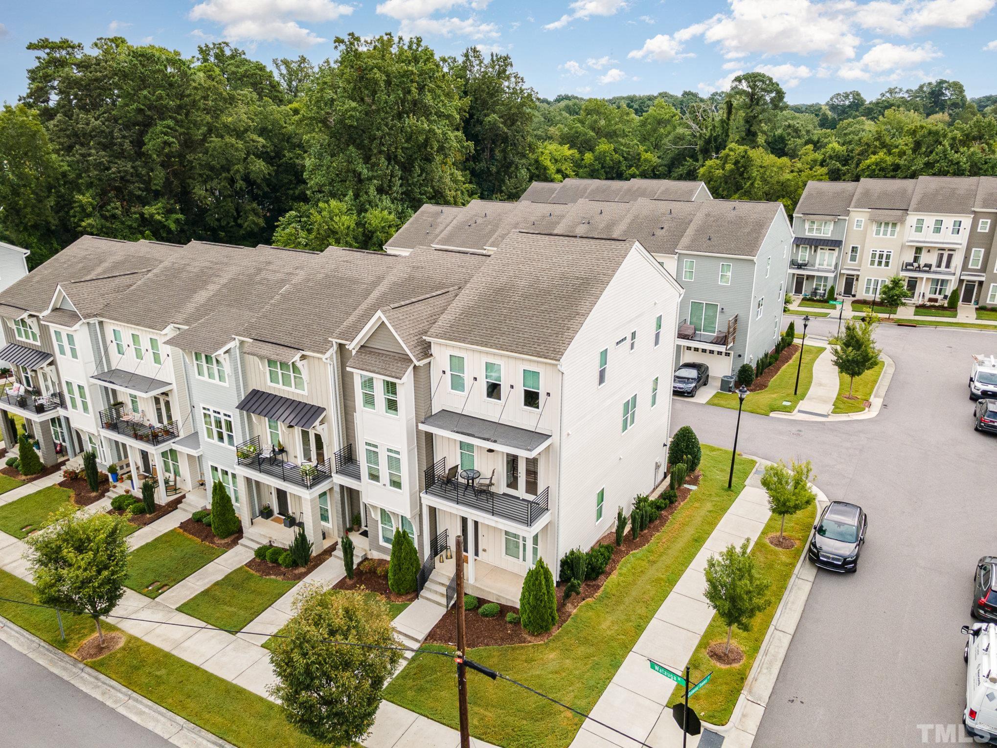626 Watauga Street Raleigh, NC 27604 - Photo 29 of 30 an aerial view of residential houses with outdoor space and swimming pool