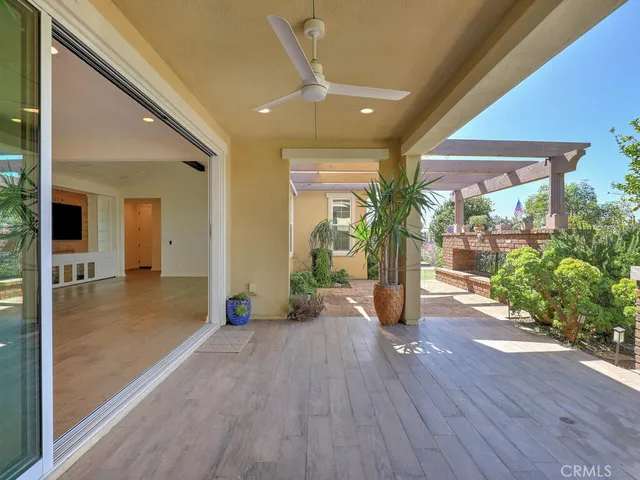 a view of a chairs and table on the wooden floor