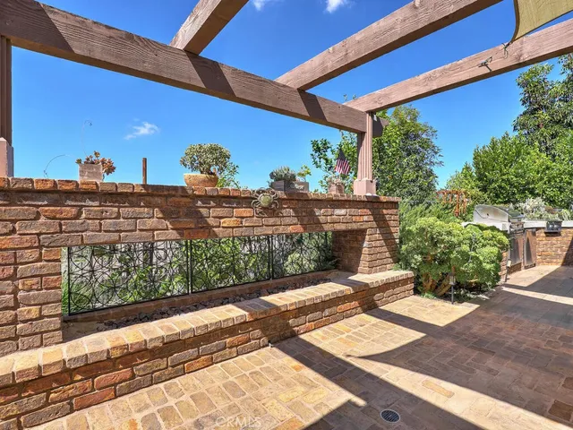 a view of a house with a backyard and garden