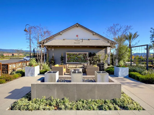 a view of a swimming pool with chairs