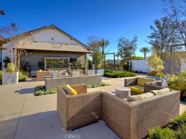 a view of a house with patio outdoor kitchen