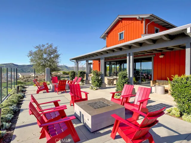 a view of a cafe with sitting area