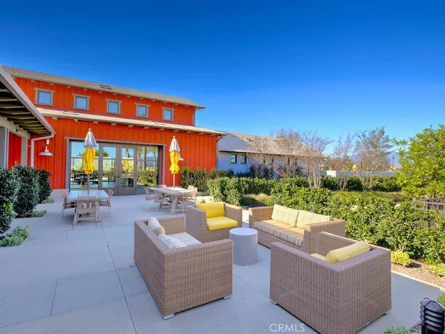 a backyard of a house with seating space