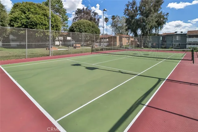 a view of an outdoor space and tennis court