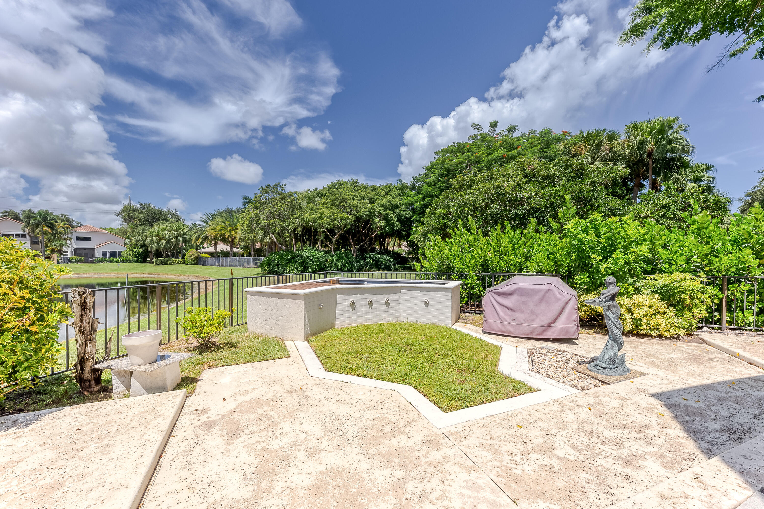 2465 Northwest 66th Drive Boca Raton, FL 33496 - Photo 30 of 41 Backyard by Lake