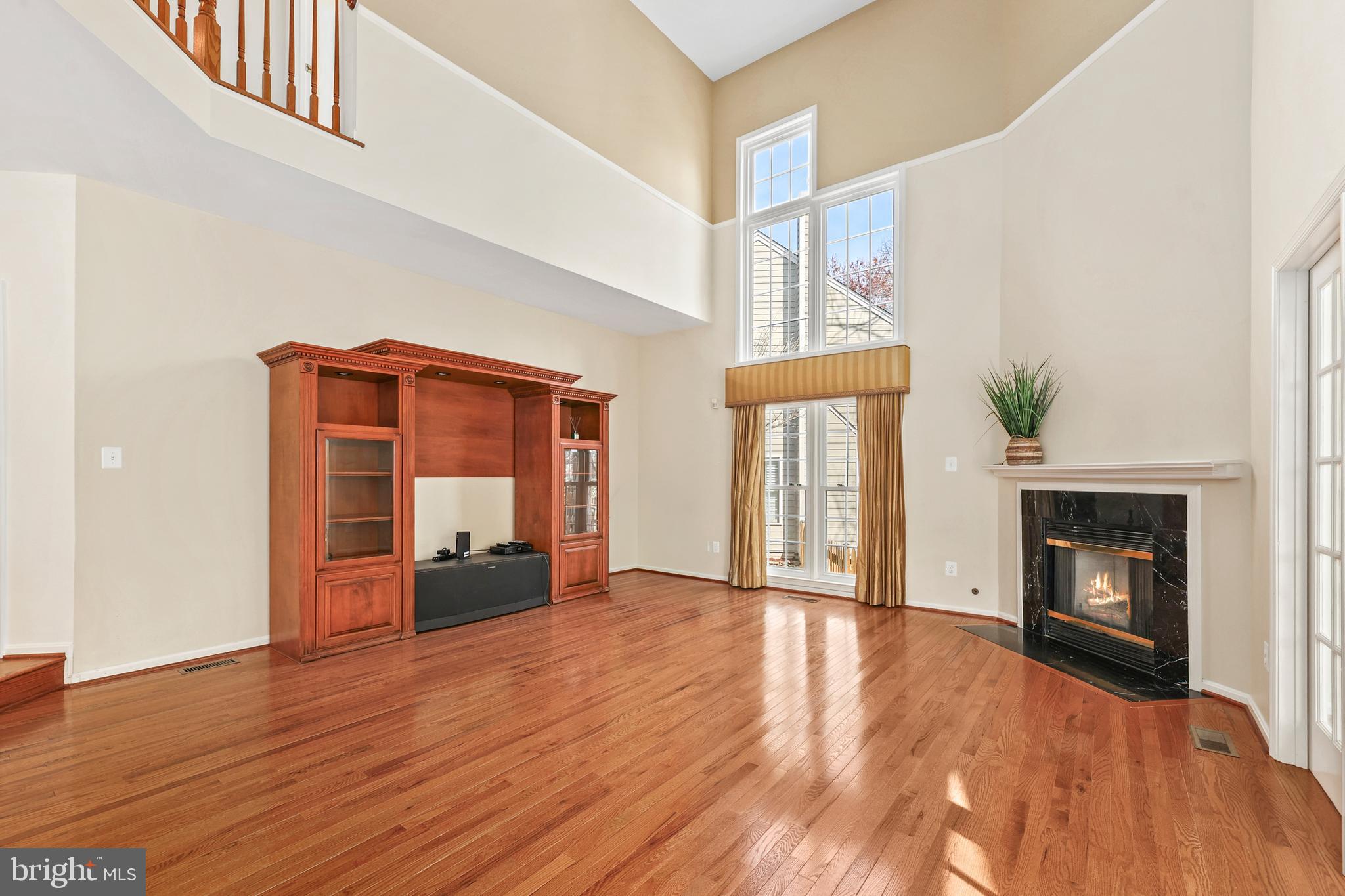 11405 Northwind Court Reston, VA 20194 - Photo 27 of 60 Family room has vaulted ceilings and fireplace