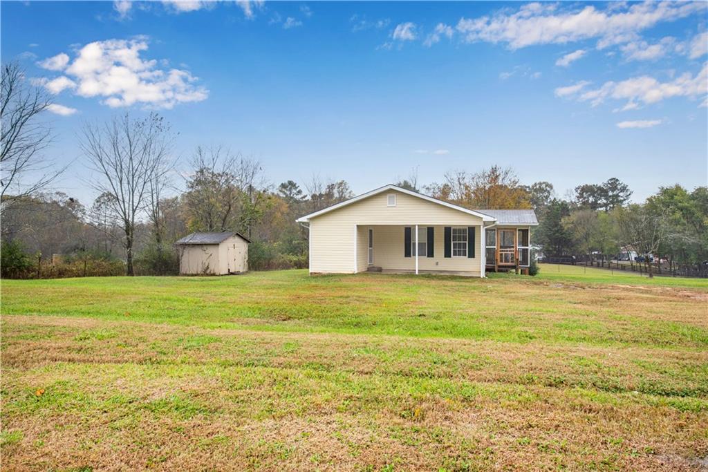 700 Tilley Road Talking Rock, GA 30175 - Photo 28 of 32 a front view of a house with a big yard