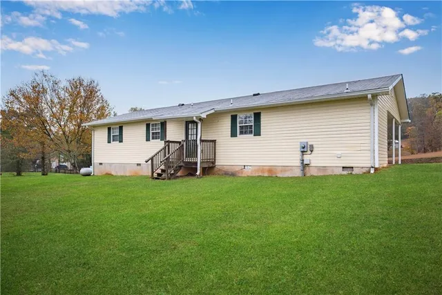 a view of a backyard with a garden