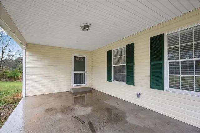 a front view of a house with a garage