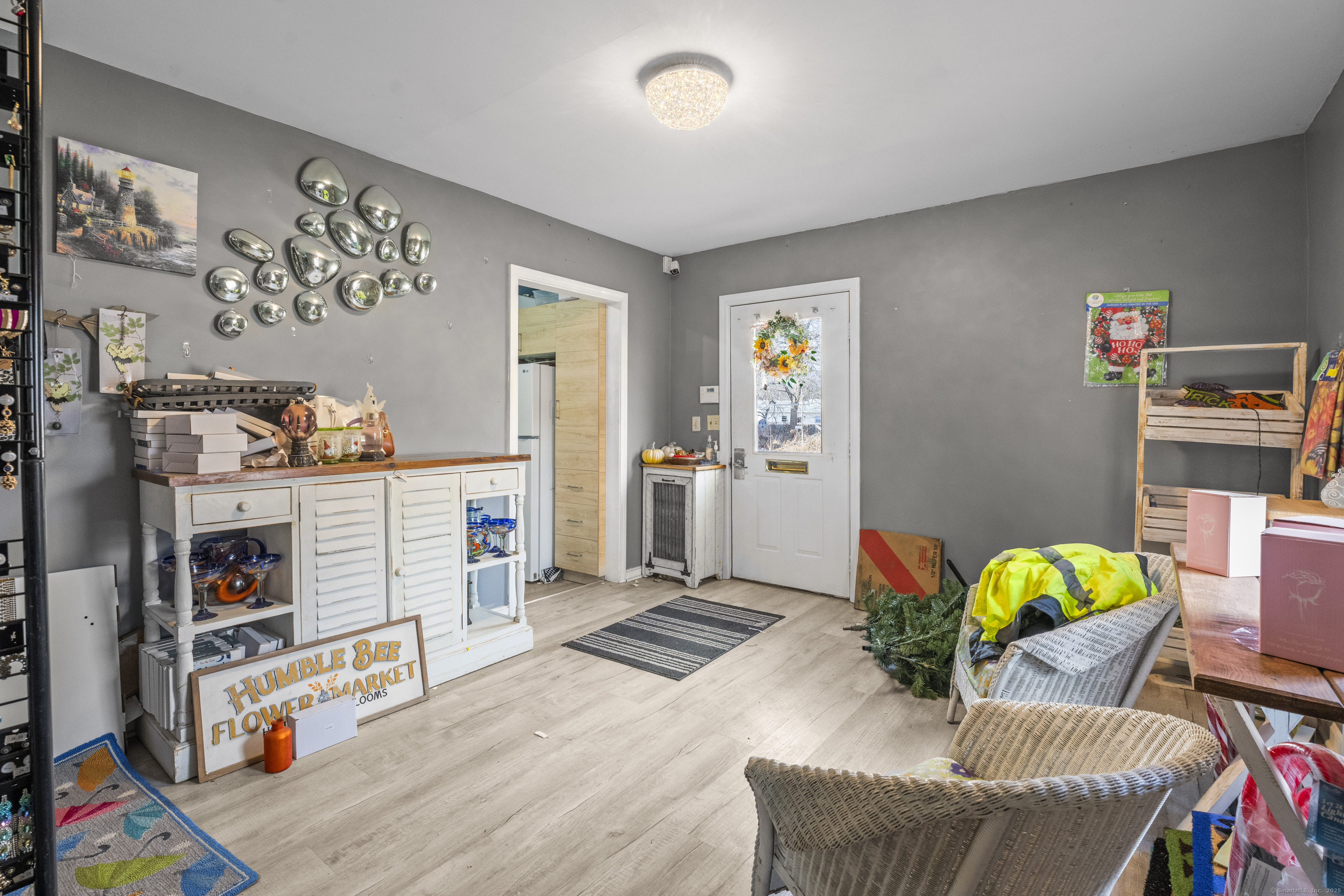 287 Hazard Avenue Enfield, CT 06082 - Photo 12 of 28 a living room with furniture and a fireplace