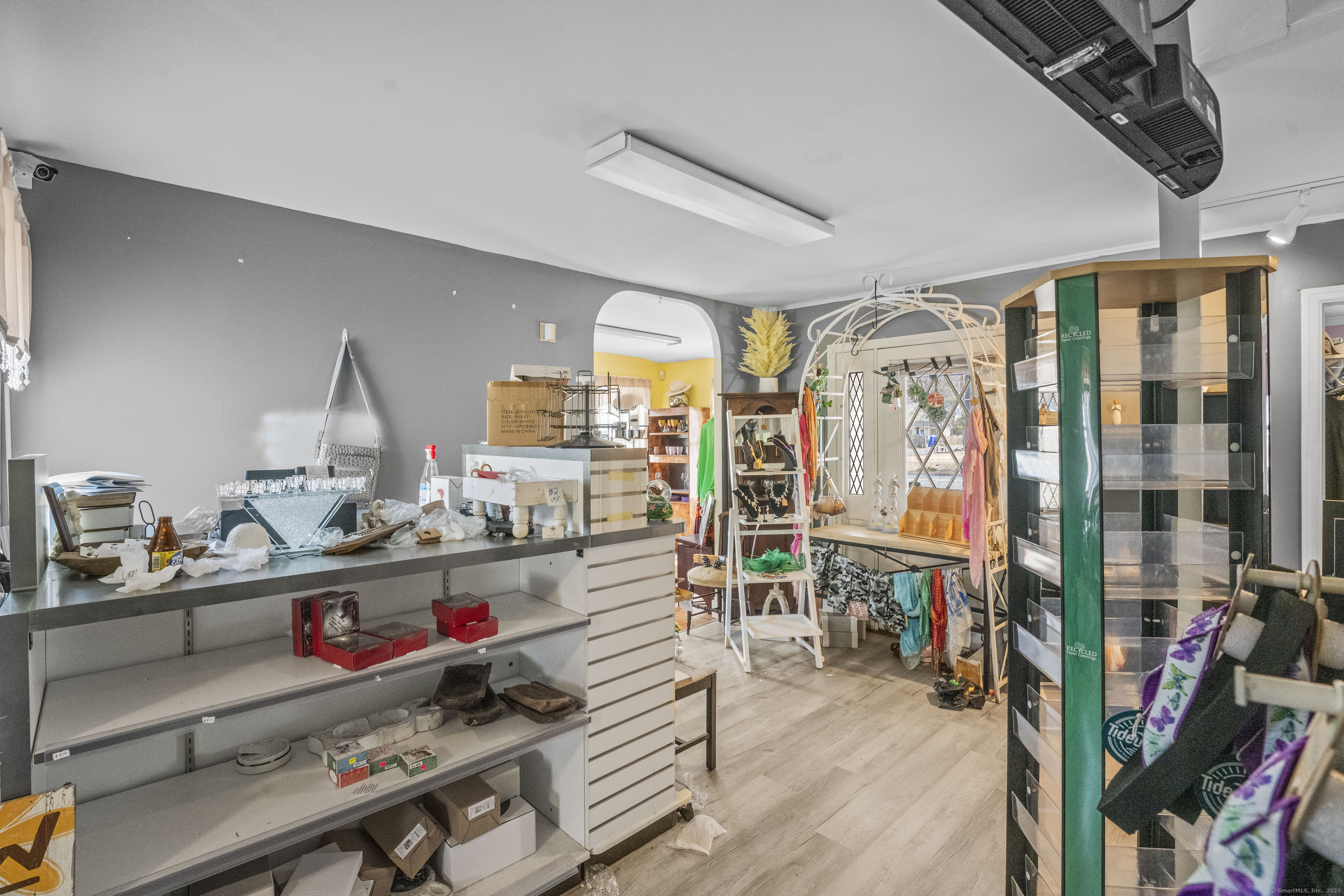 287 Hazard Avenue Enfield, CT 06082 - Photo 13 of 28 a room with gym equipment and a large window