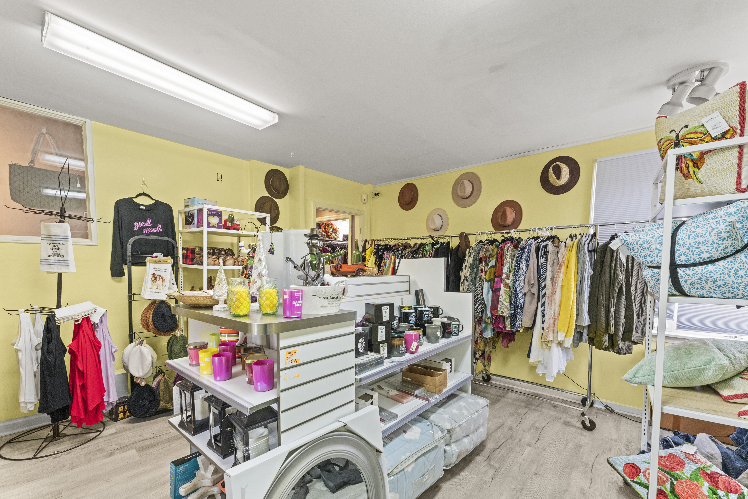 287 Hazard Avenue Enfield, CT 06082 - Photo 19 of 28 a view of walk in closet with clothes and shoes