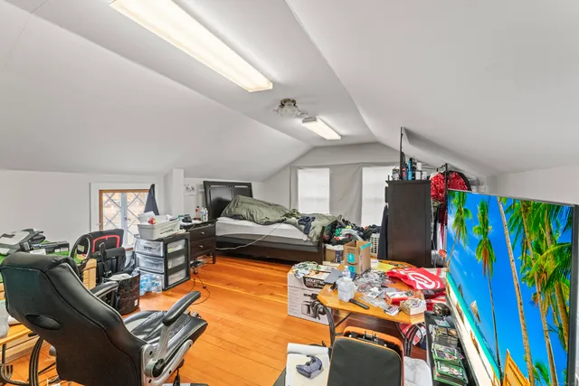 a living room with furniture fireplace and a flat screen tv