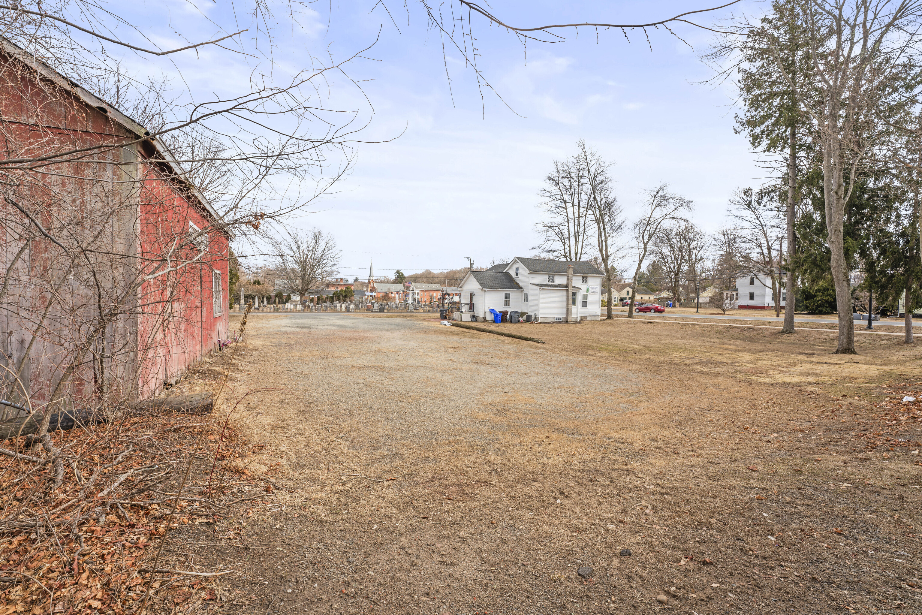 287 Hazard Avenue Enfield, CT 06082 - Photo 3 of 28 a view of a road with a building in the background