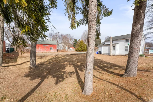 a view of a street with an empty space