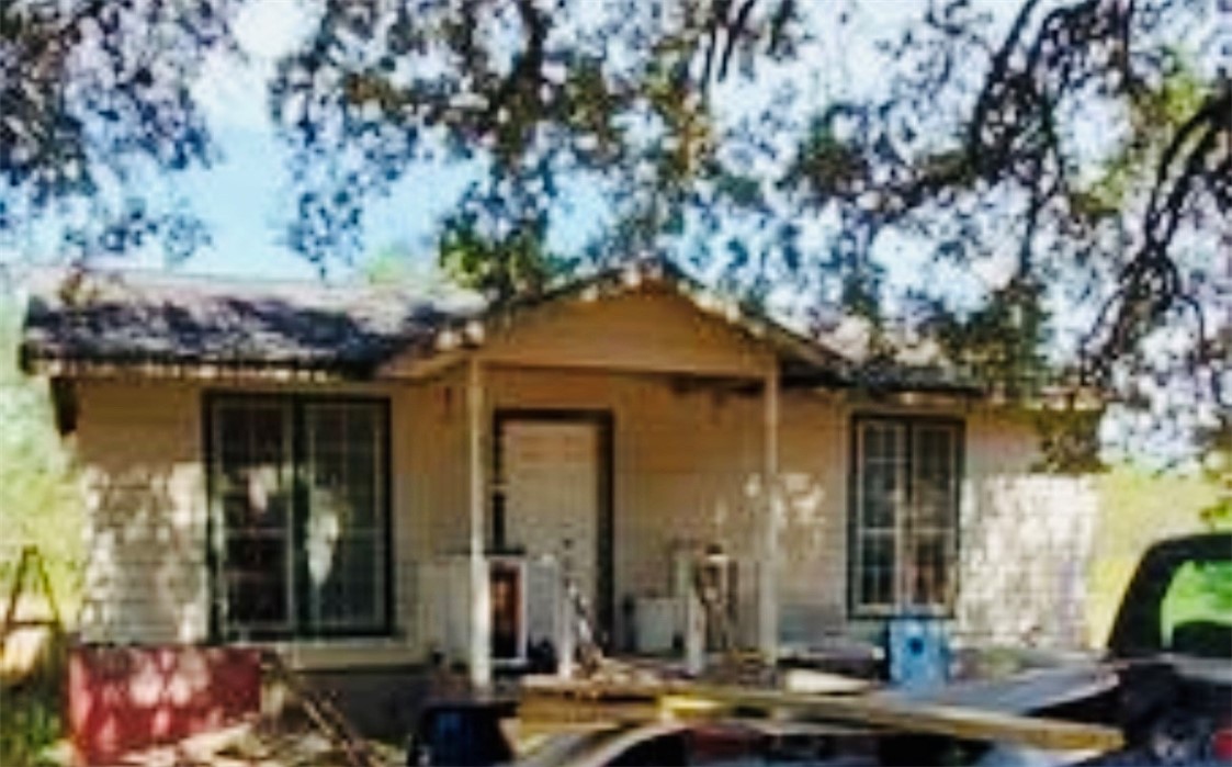 212 Pr Joe Alex Somerset, TX 78069 - Photo 1 of 18 a front view of a house with a tree