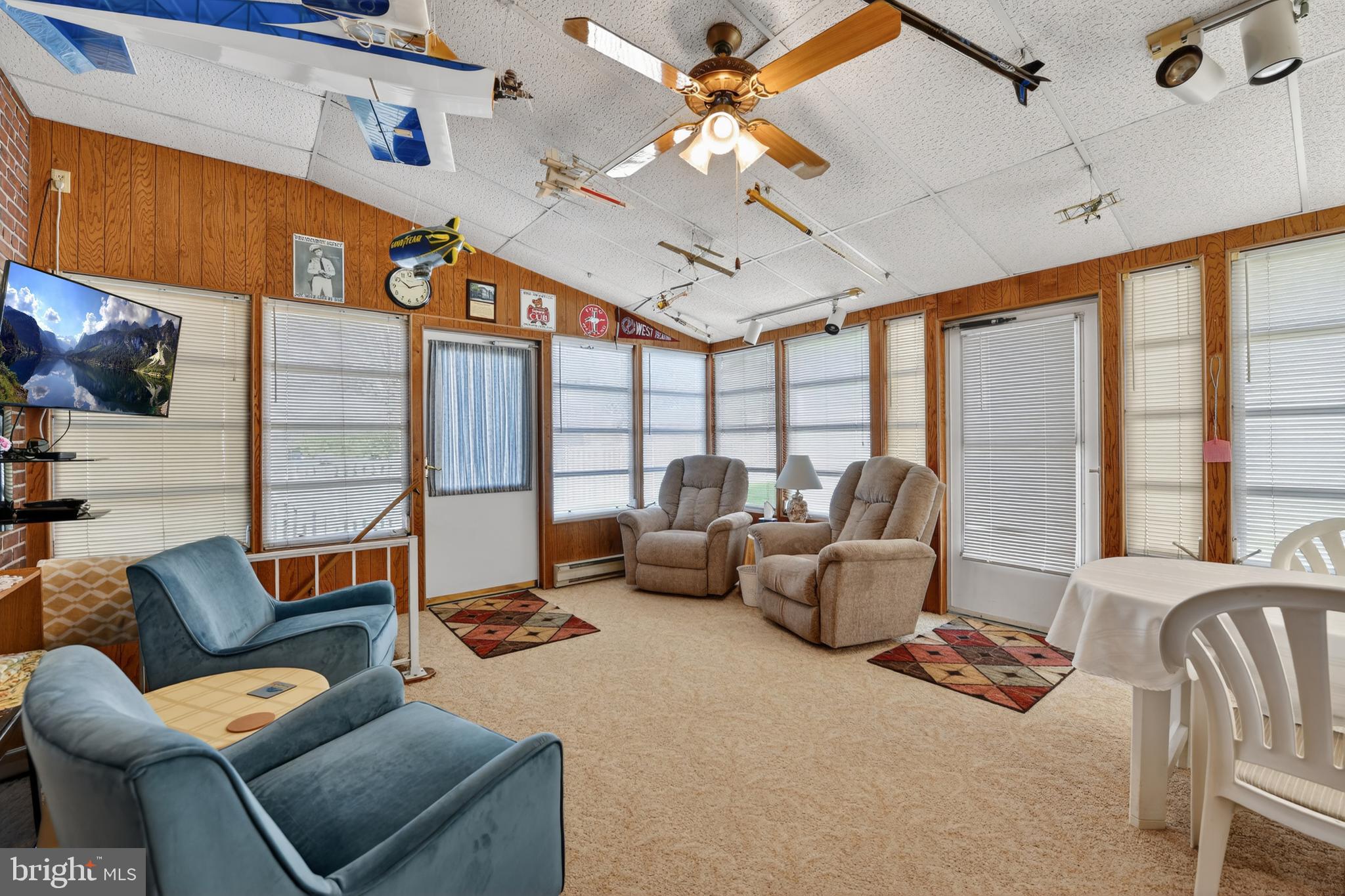 397 Pine Street Reading, PA 19611 - Photo 15 of 42 a living room with furniture ceiling fan and a large window