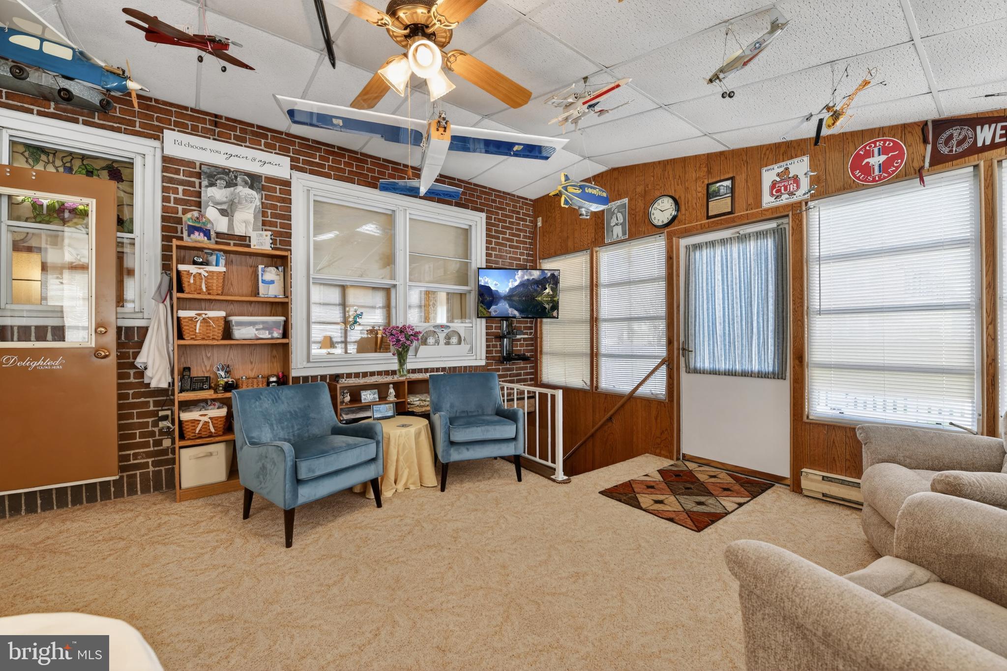 397 Pine Street Reading, PA 19611 - Photo 17 of 42 a living room with furniture a ceiling fan and a window