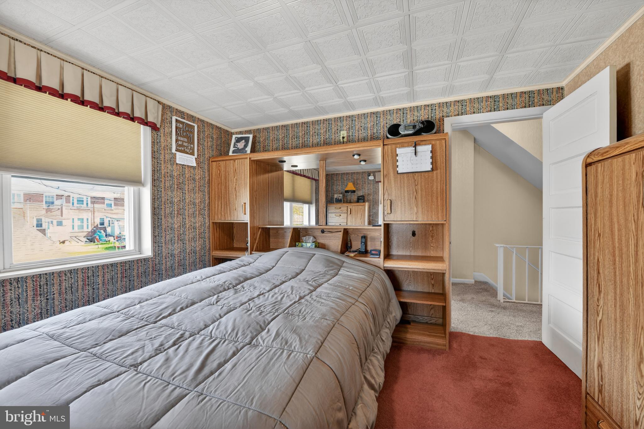 397 Pine Street Reading, PA 19611 - Photo 19 of 42 a bed room with a bed and a walk in closet