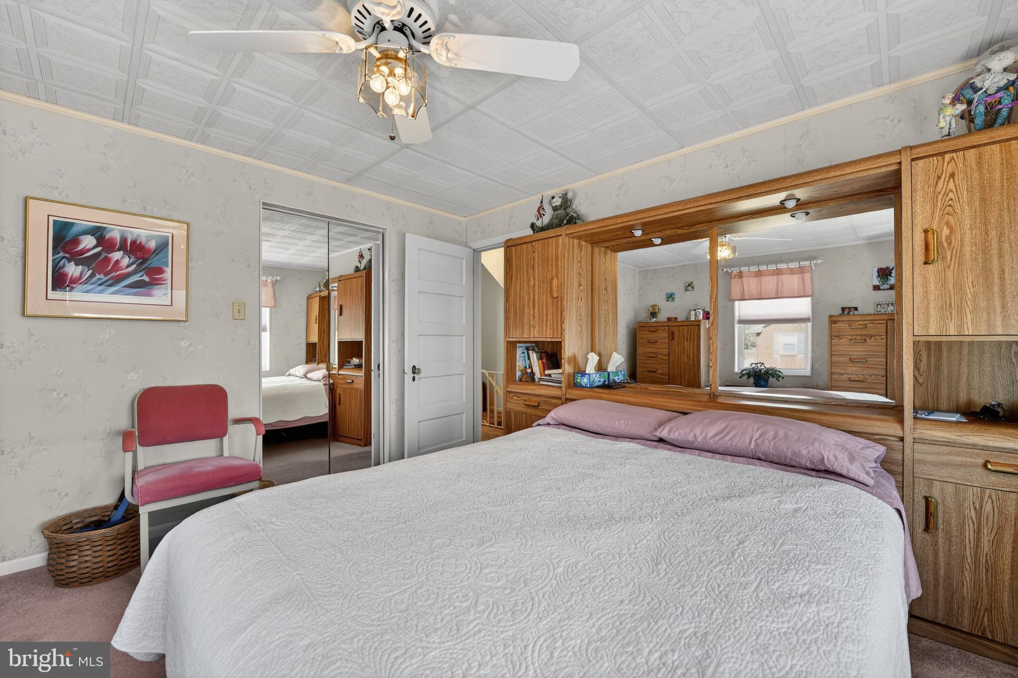 397 Pine Street Reading, PA 19611 - Photo 21 of 42 a bedroom with bed and a chandelier