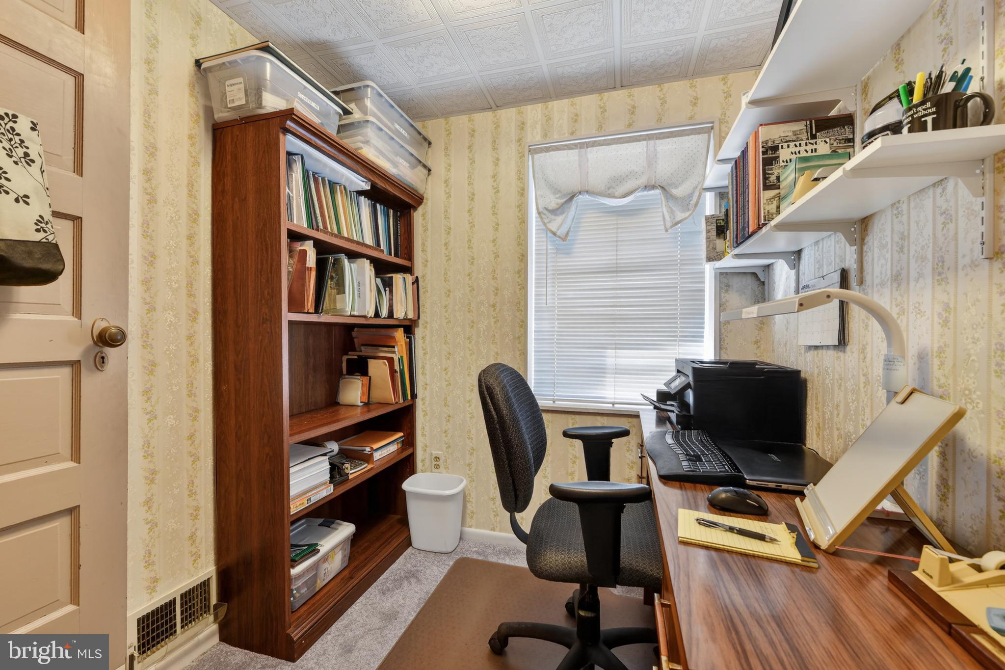 397 Pine Street Reading, PA 19611 - Photo 22 of 42 a view of a workspace with furniture and wooden floor