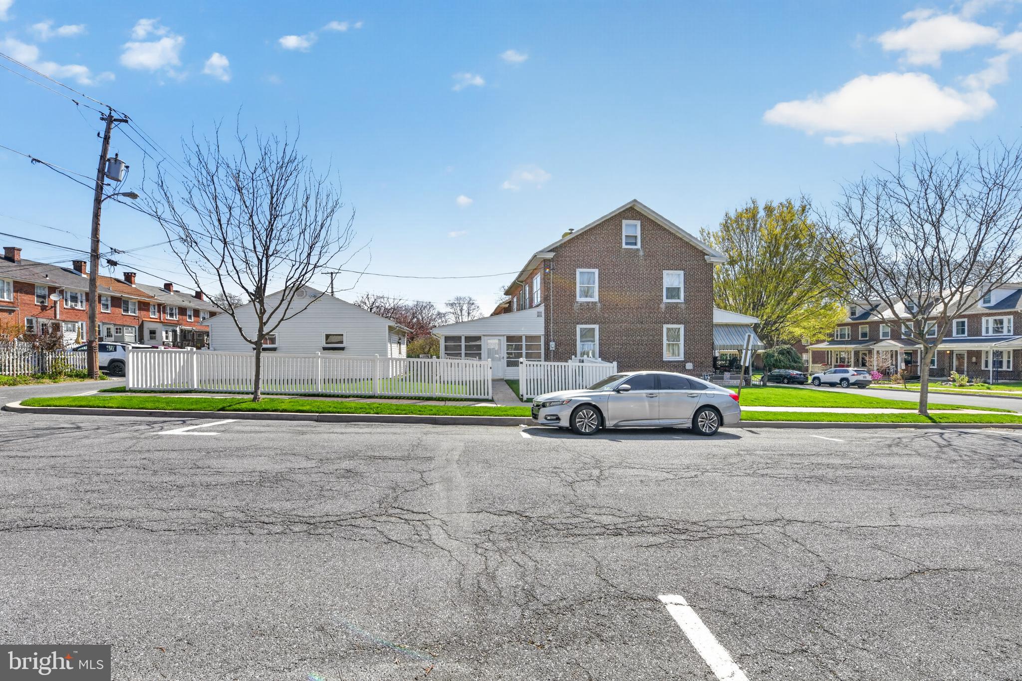 397 Pine Street Reading, PA 19611 - Photo 30 of 42 a view of a house with a yard and large trees