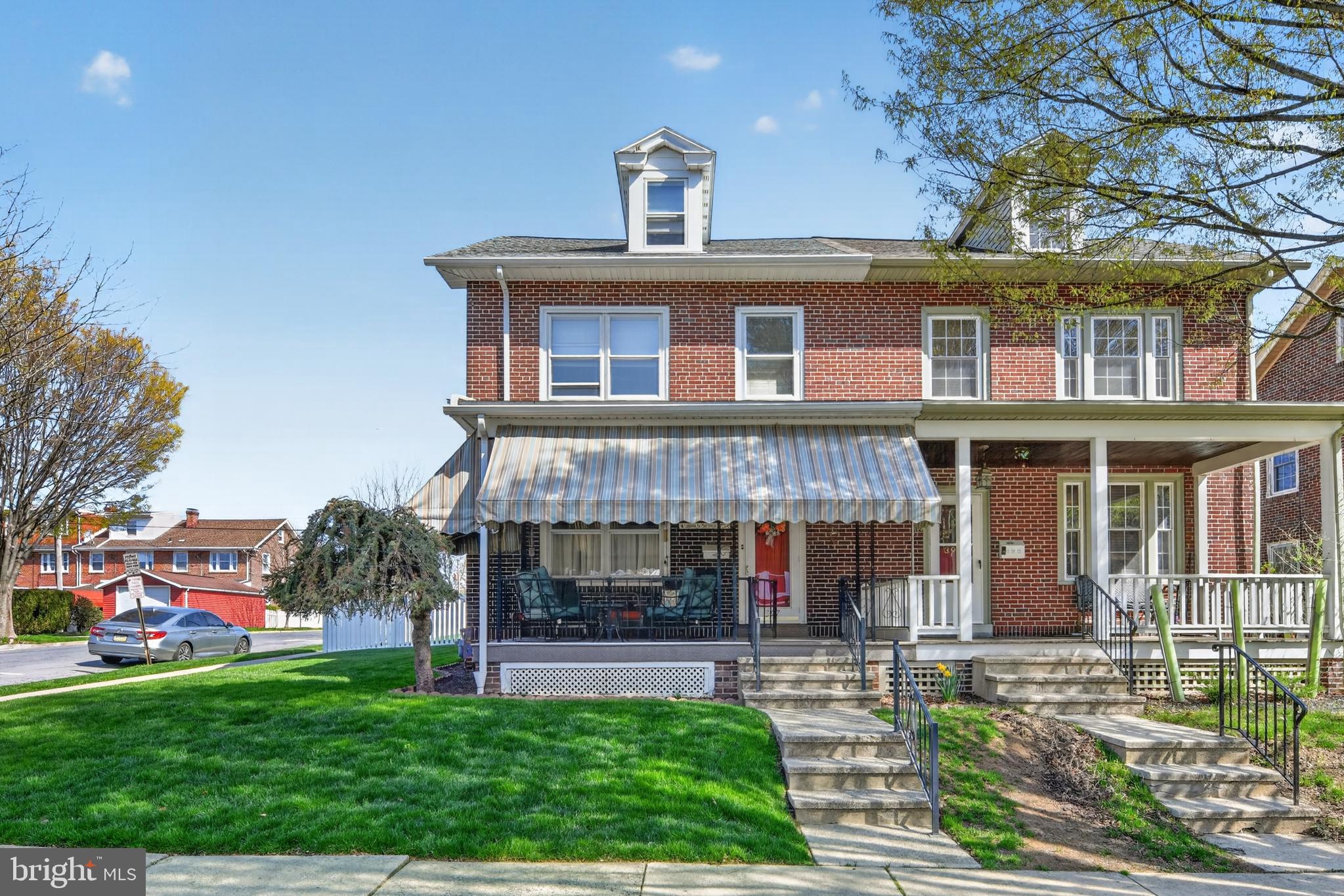 397 Pine Street Reading, PA 19611 - Photo 3 of 42 a view of a building with a garden