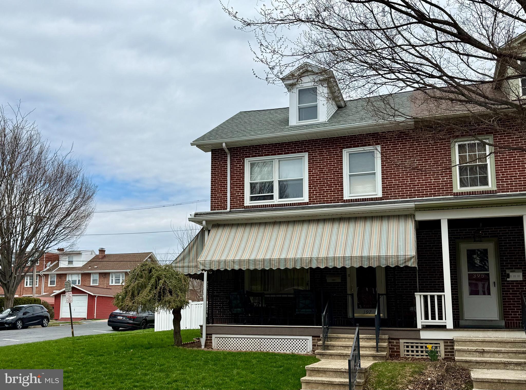 397 Pine Street Reading, PA 19611 - Photo 37 of 42 a front view of a house with garden