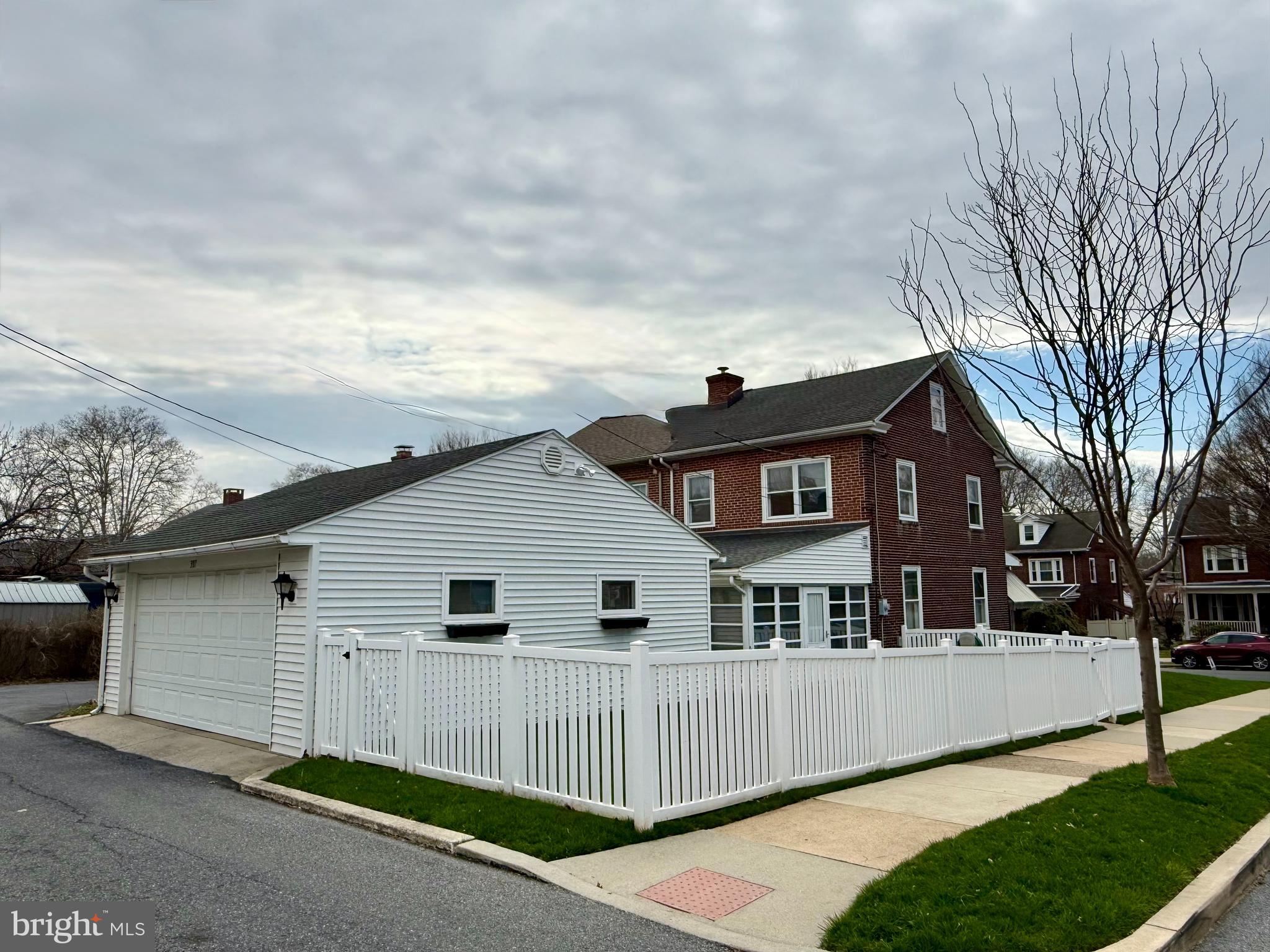 397 Pine Street Reading, PA 19611 - Photo 40 of 42 a front view of a house with a yard