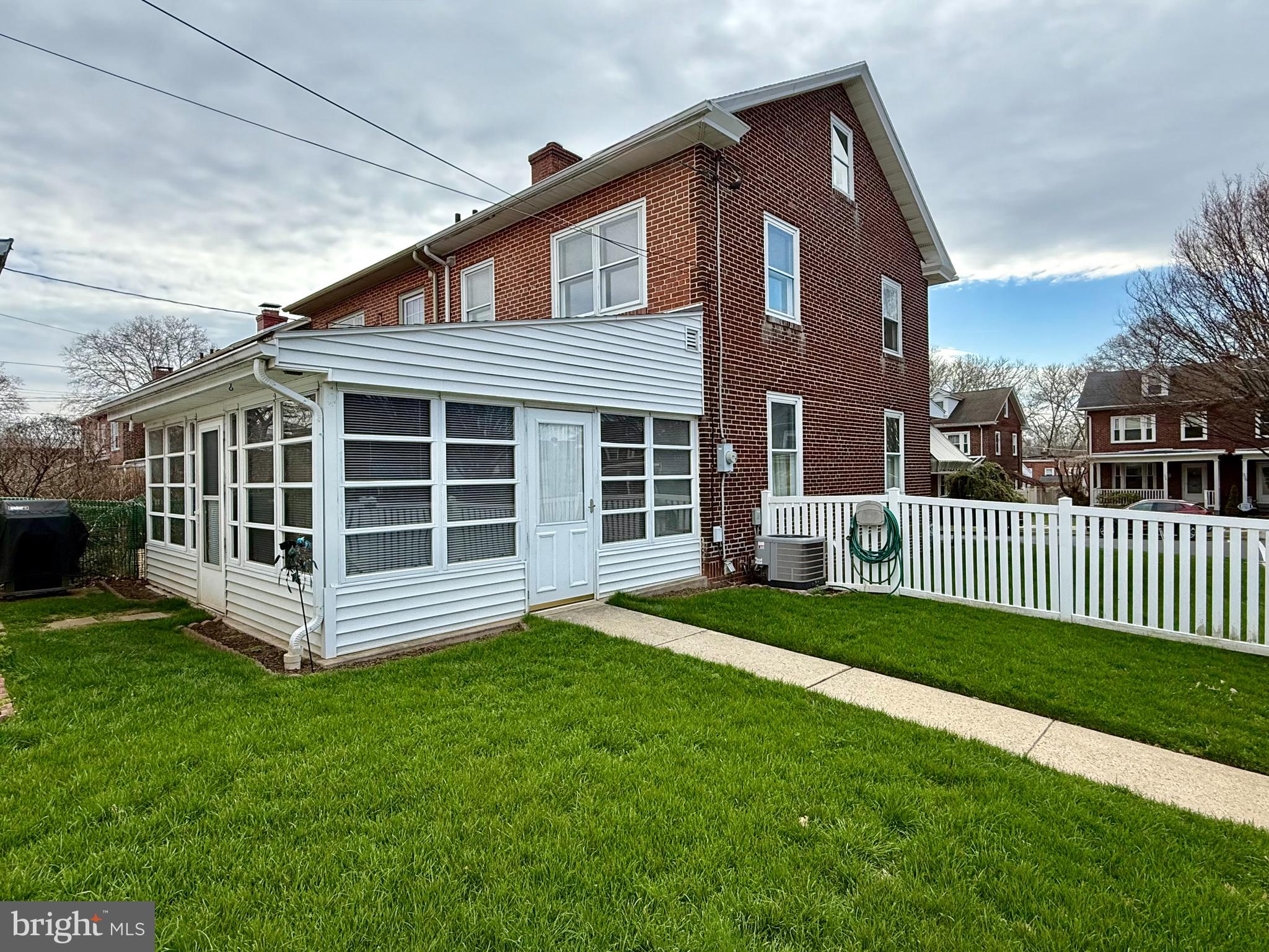 397 Pine Street Reading, PA 19611 - Photo 41 of 42 a view of a house with a yard and a garden
