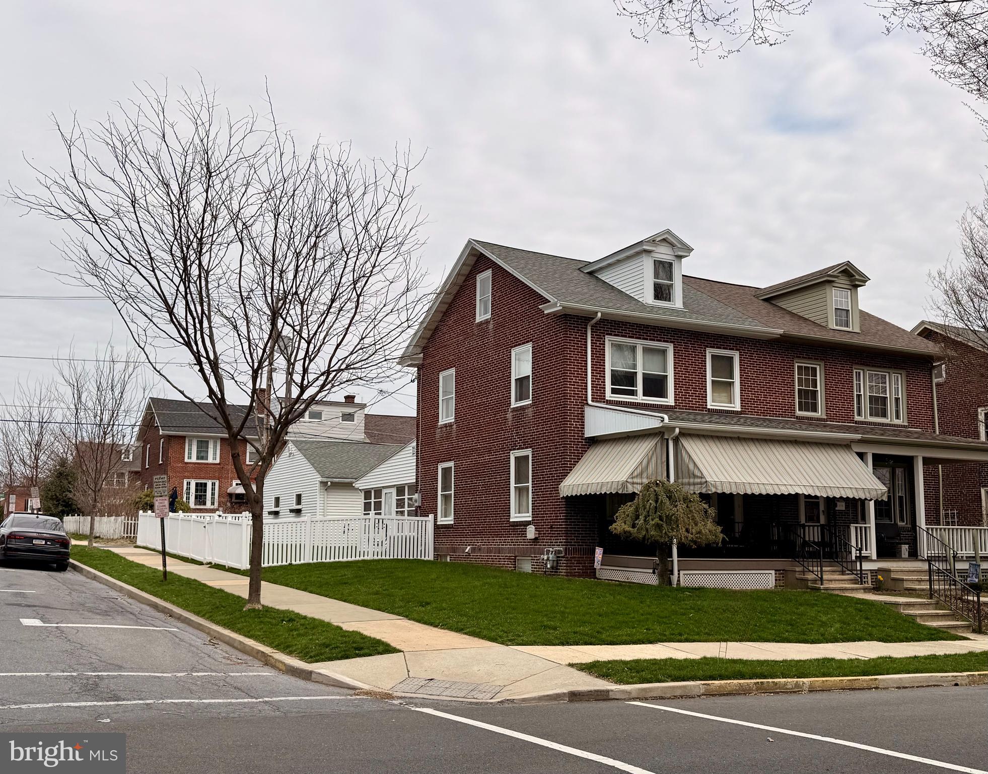 397 Pine Street Reading, PA 19611 - Photo 42 of 42 a front view of a house with a yard