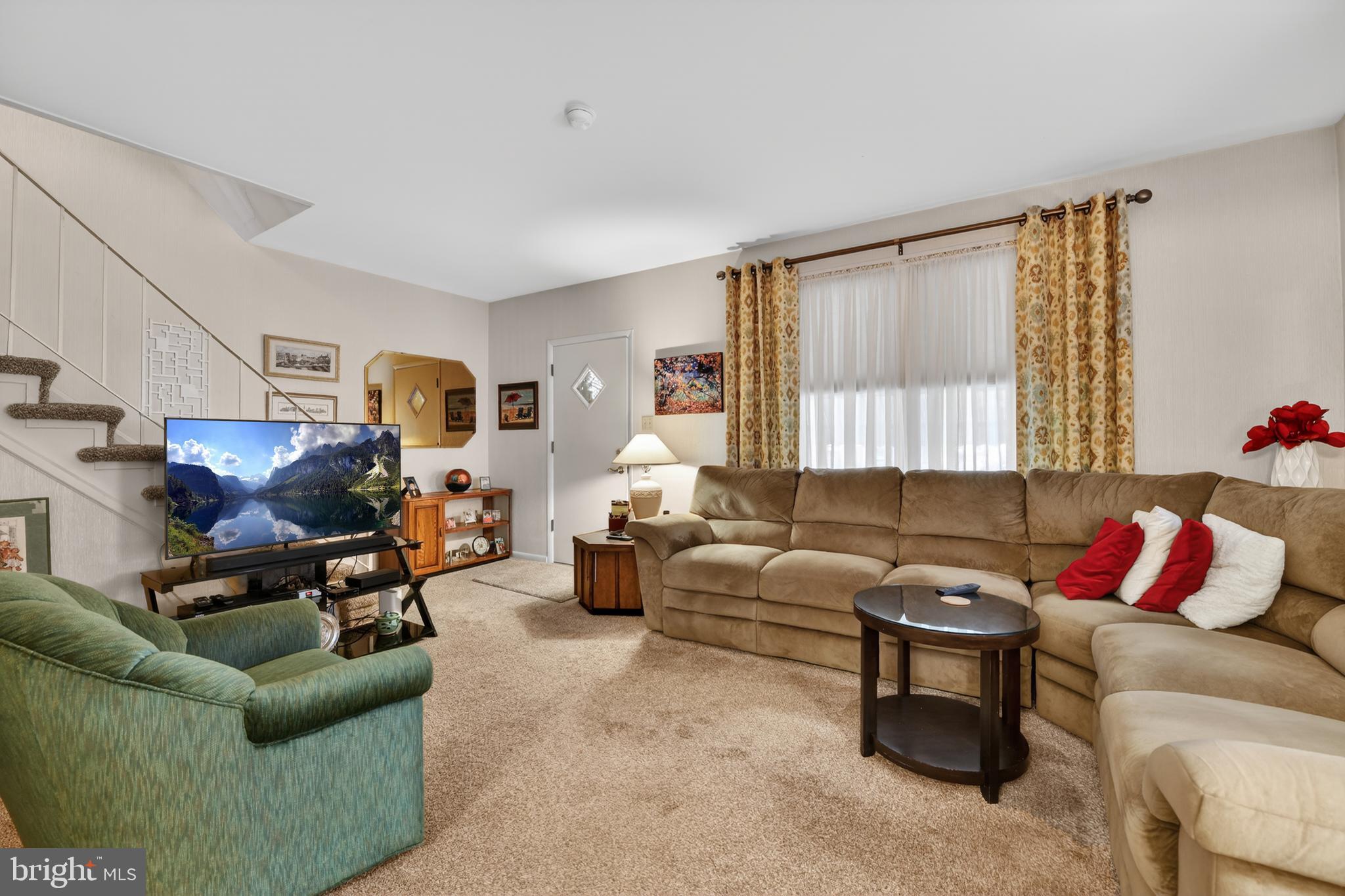 397 Pine Street Reading, PA 19611 - Photo 6 of 42 a living room with furniture and a flat screen tv