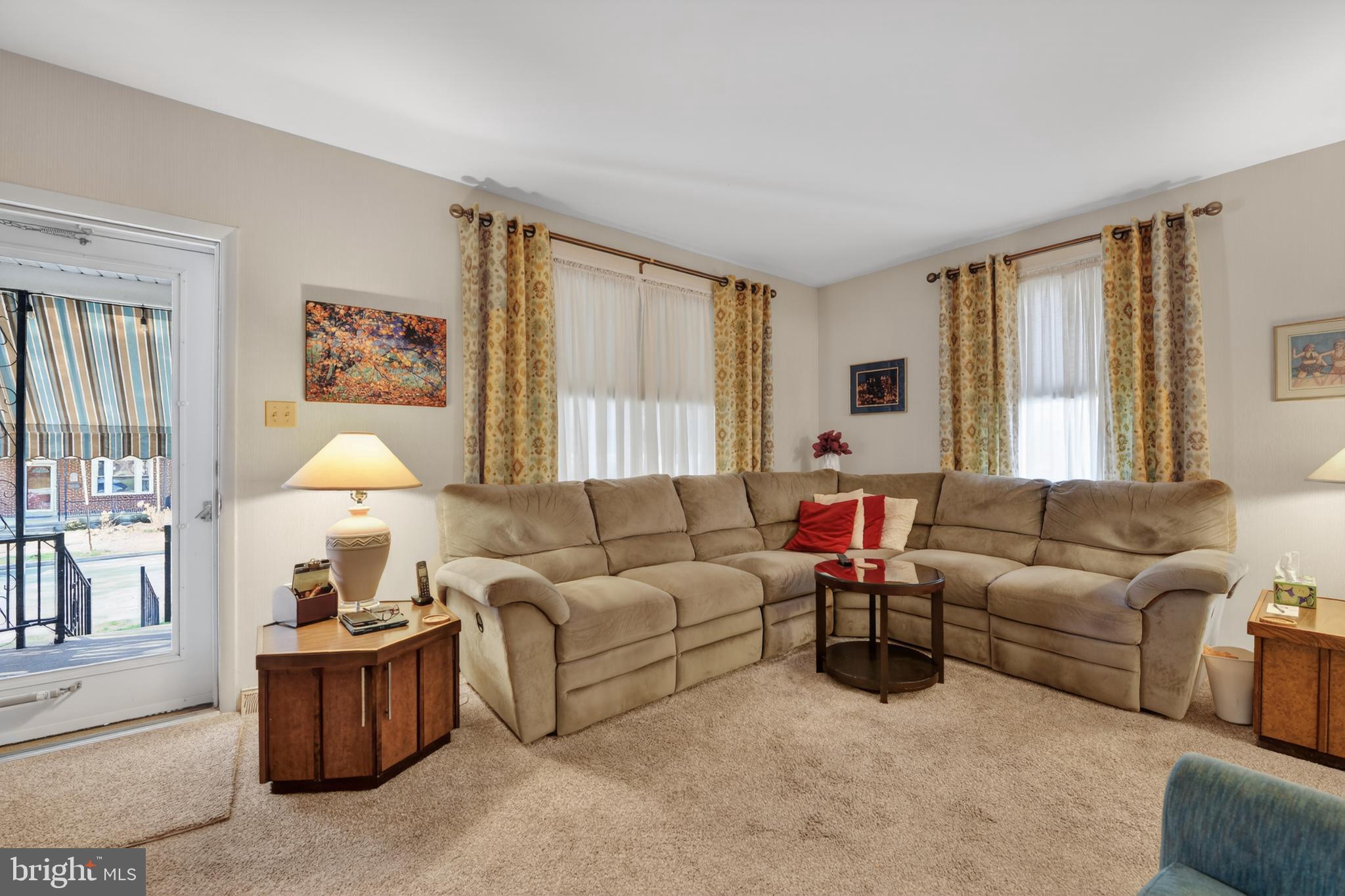 397 Pine Street Reading, PA 19611 - Photo 7 of 42 a living room with furniture and a large window