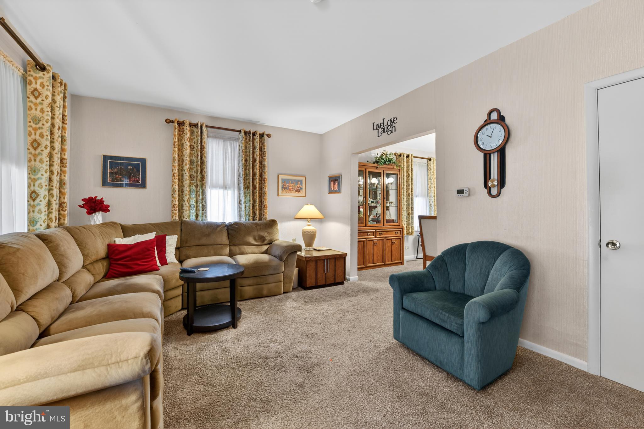 397 Pine Street Reading, PA 19611 - Photo 8 of 42 a living room with furniture and a window