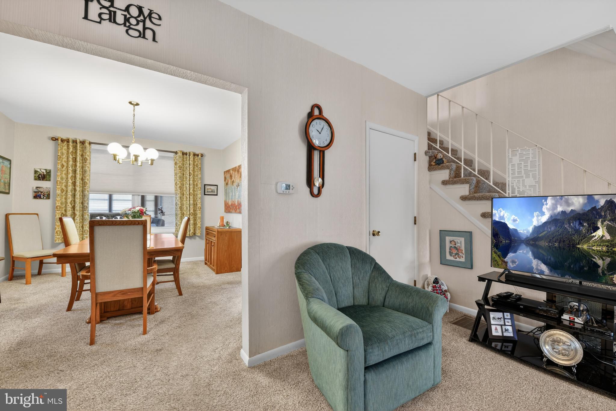 397 Pine Street Reading, PA 19611 - Photo 9 of 42 a living room with furniture a flat screen tv and a couch