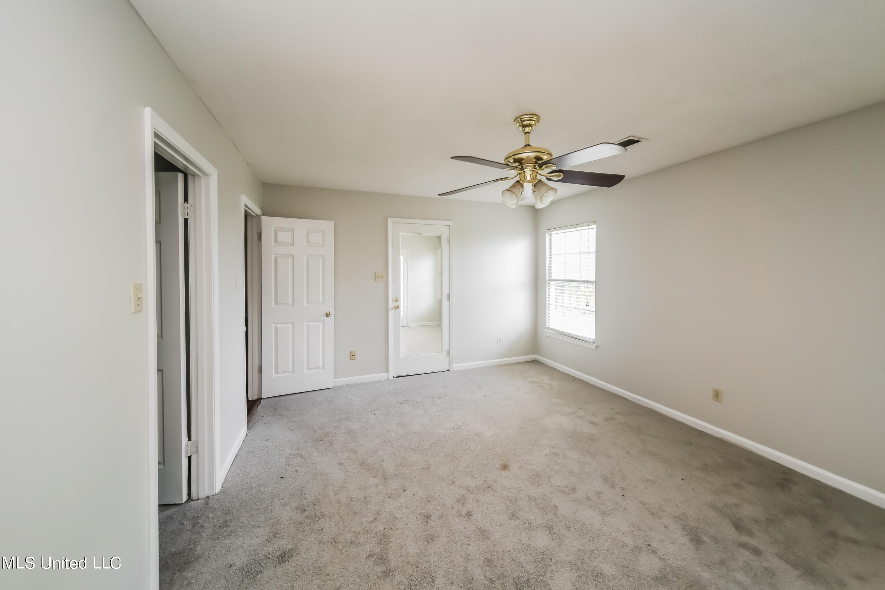 1107 Charstone Drive Southaven, MS 38671 - Photo 10 of 15 010-photo-primary-bedroom-11091249