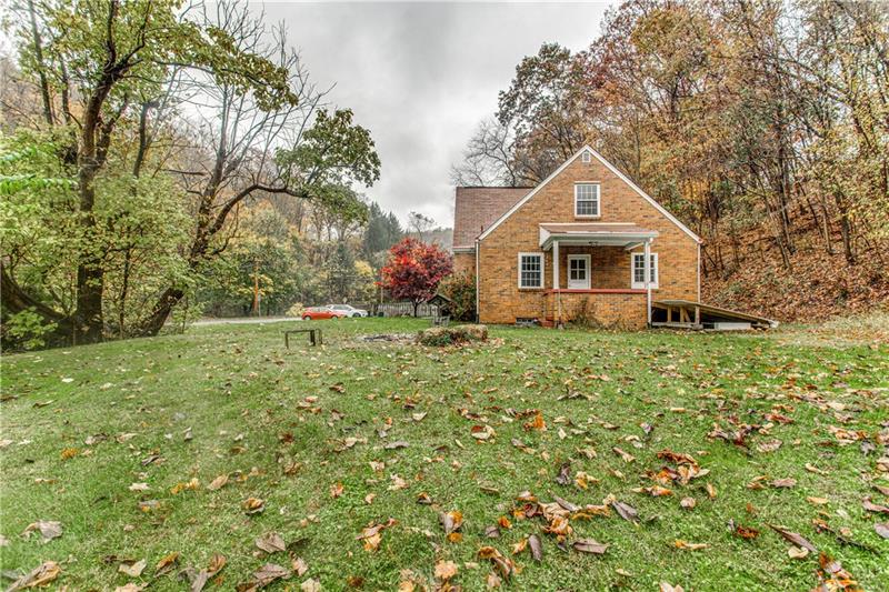919 Glenfield Road Sewickley, PA 15143 - Photo 2 of 24 Beautiful side yard and fire pit.