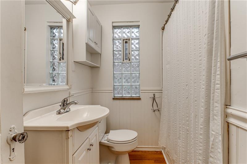 919 Glenfield Road Sewickley, PA 15143 - Photo 13 of 24 Pretty and updated first floor bathroom located right next to the master bedroom.