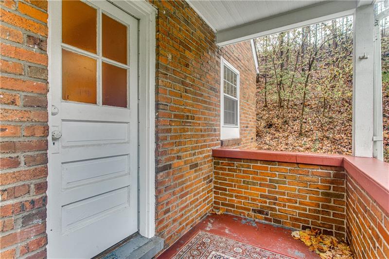 919 Glenfield Road Sewickley, PA 15143 - Photo 15 of 24 This smaller porch is close to the kitchen and dining room. It provides the perfect space for your grill and overlooks the large side yard.