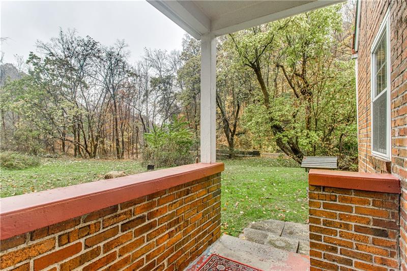 919 Glenfield Road Sewickley, PA 15143 - Photo 16 of 24 A view of the side yard from the covered porch.
