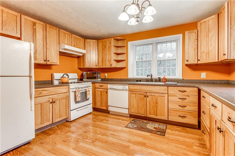 919 Glenfield Road Sewickley, PA 15143 - Photo 3 of 24 Look at the beautiful cabinets and gorgeous granite counter tops! This is a cook's paradise. Not a cook? Enjoy this pretty and bright space to stand while pouring your morning coffee.