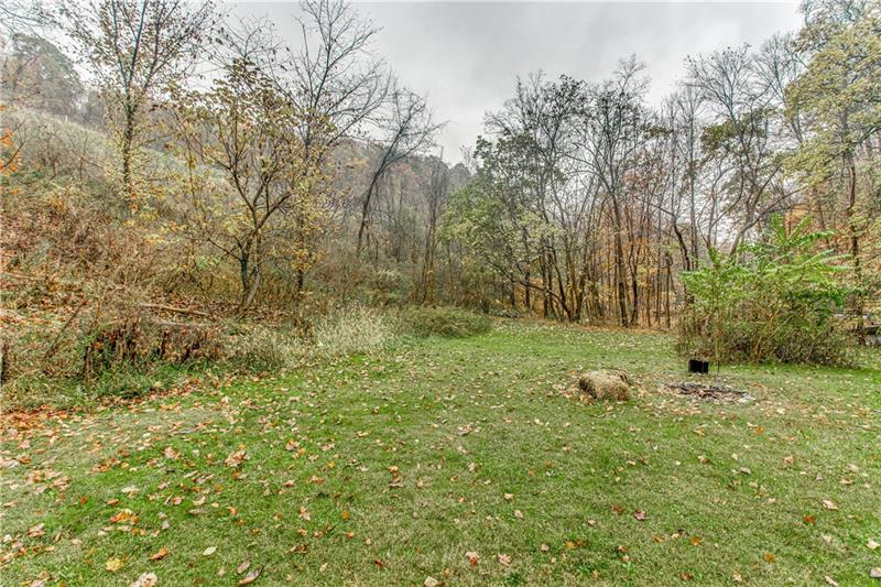 919 Glenfield Road Sewickley, PA 15143 - Photo 22 of 24 Beautiful and private side yard with fire pit.