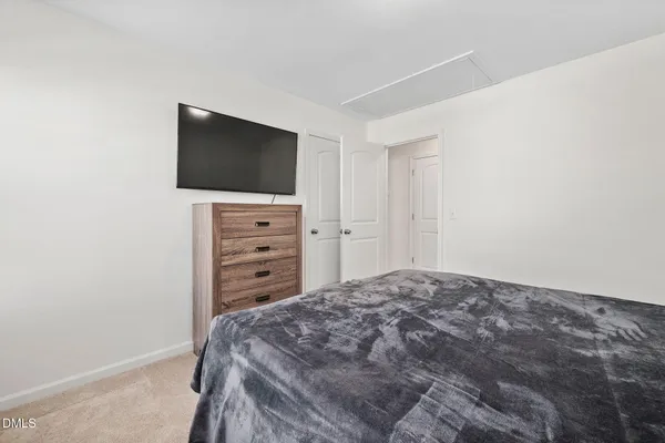 a view of a livingroom with a flat tv screen