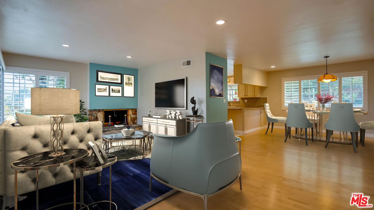 9631 Crystal View Drive Tujunga, CA 91042 - Photo 2 of 57 a living room with furniture and a flat screen tv