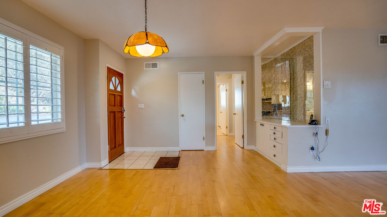 9631 Crystal View Drive Tujunga, CA 91042 - Photo 43 of 57 a bedroom with a bed and a window