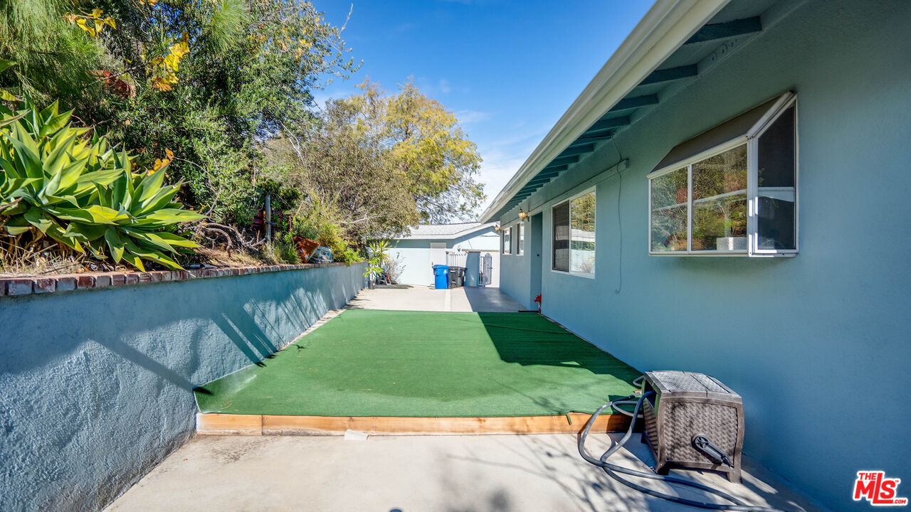 9631 Crystal View Drive Tujunga, CA 91042 - Photo 54 of 57 a front view of a house with a yard