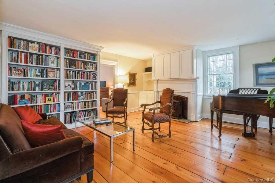 1141 Beekman Road Hopewell Junction, NY 12533 - Photo 14 of 36 a work room with furniture and a book shelf