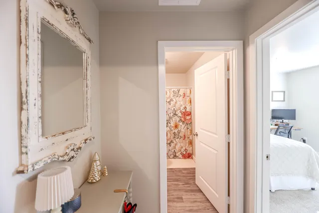 a bathroom with a shower and a sink