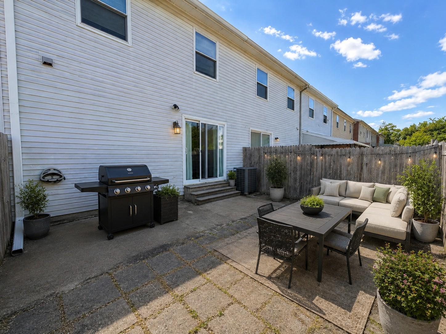 813 Thimbleberry Road, Unit 813 Baltimore, MD 21220 - Photo 27 of 32 Virtual Stage:Charming outdoor retreat with grill.